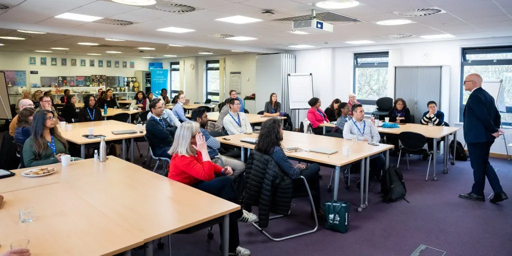 Professor Charlie Jeffrey talks to the participants