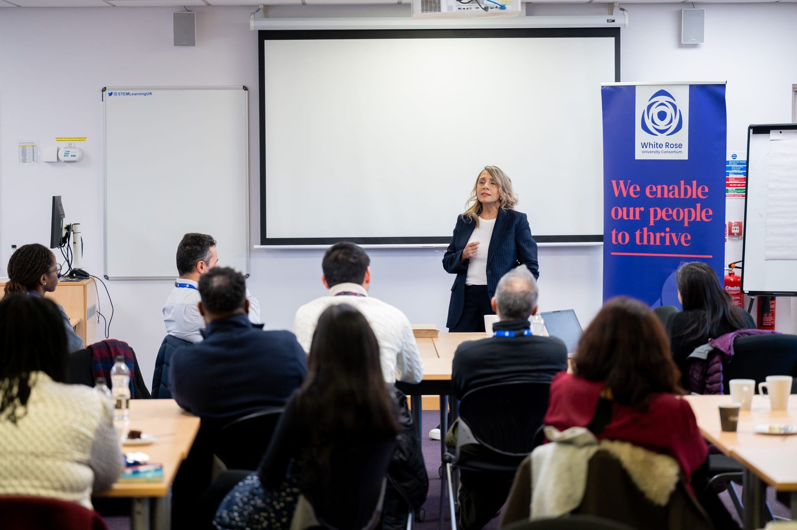 Professor Kiran Trehan addresses the room