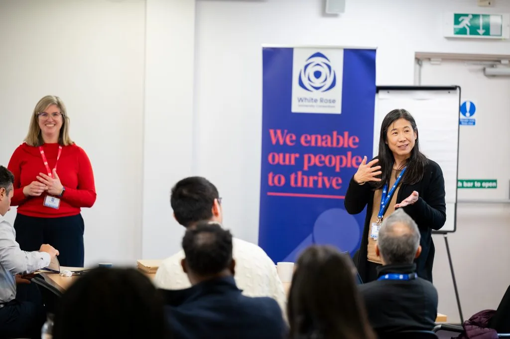 Speakers addressing the audience