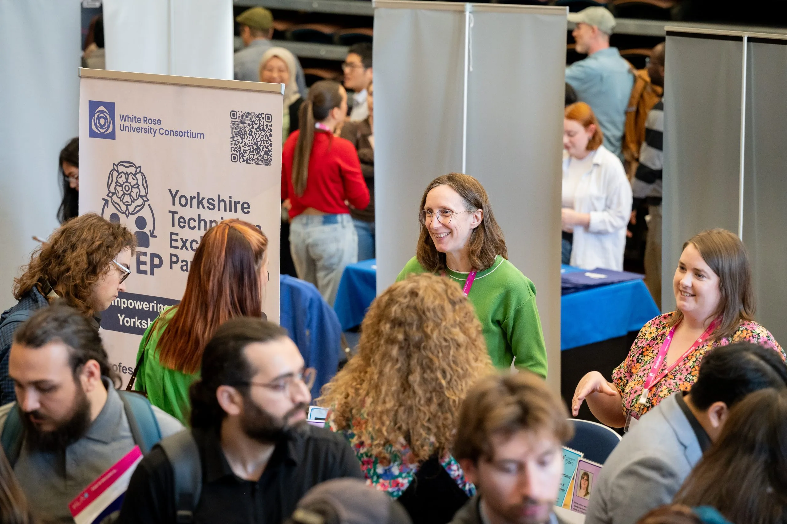 Woman talking in front of banner that reads 'Yorkshire Technician Exchange Partnership'