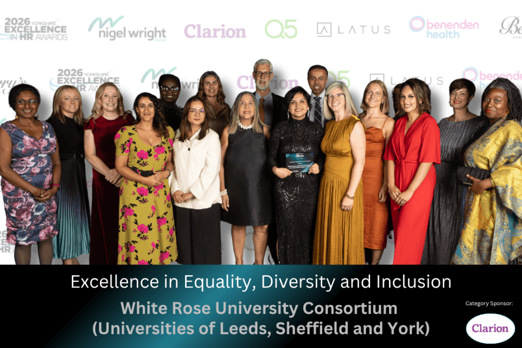 Group of people in front of white background with text that reads 'Excellence in Equality, Diversity and Inclusion, White Rose University Consortium
